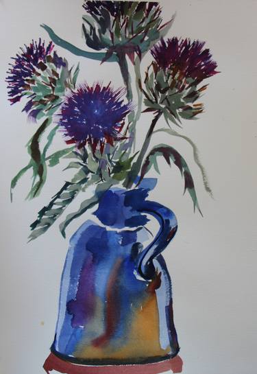 Artichoke flowers in blue jug thumb