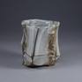 The very special coffee cup. Suitable also as guinomi for sake or other strong drinks. Black clay, white glaze. Good grip, pleasant in hand.
Created in a wabi-sabi aesthetic way.
Handcut, glazed and wood fired at Pottery Park studio Kiln in 2018.
volume about 190 ml