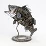 Sea bass fish metal sculpture art has made from recycled scrap metal or unusable steel.