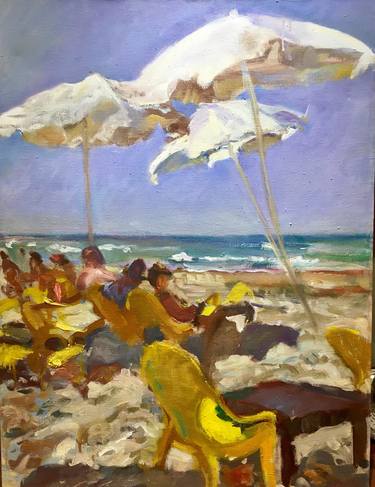 People on the beach with yellow chairs and white umbrellas thumb