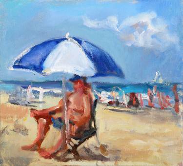 Sunbathing man with blue and white umbrella thumb