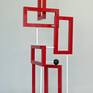 "Redtangle" is a powder coated, welded steel , geometric sculpture, inspired by the Russian Constructivism movement. It is suitable for placement indoors or outdoors (mounting clips for use outdoors, comes included).
