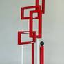 "Redtangle" is a powder coated, welded steel , geometric sculpture, inspired by the Russian Constructivism movement. It is suitable for placement indoors or outdoors (mounting clips for use outdoors, comes included).