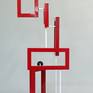 "Redtangle" is a powder coated, welded steel , geometric sculpture, inspired by the Russian Constructivism movement. It is suitable for placement indoors or outdoors (mounting clips for use outdoors, comes included).