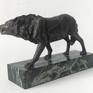 A miniature wolf (bronze), I was inspired by stories of a hunter about animals and I decided to make a wolf. This was an unrelenting, strong, wild beast, born free in the wild.