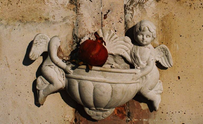 Angel and pomegranate