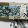 endapaper detail with bone paintings and beadwork