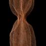 This is a small sculpture inspired by botanical, natural forms and shapes. It's made of layers of knitted copper wire.