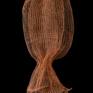 This is a small sculpture inspired by botanical, natural forms and shapes. It's made of layers of knitted copper wire.