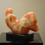 For many years, Vasily has explored the connection between the human figure, architecture, and the land.  Most of the LAND series of stone carvings he made during symposiums in Turkey and his native Ukraine.  This much smaller composition is carved from a semi-translucent orange calcite, such a gorgeous stone!  She is mounted on a black marble base,  'Red Land' weighs 13 pounds and ships from the Chicago, USA, area.  Thank you for appreciating Vasily's art.