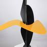 Yellow gloss contrasts with the matt  charcoal.