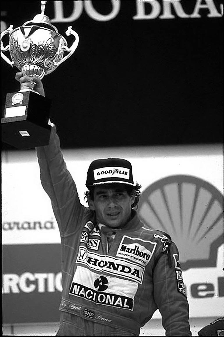 ▷ Ayrton Senna. F1. je t'ai à l'œil by Dominique Leroy, 1990, Photography