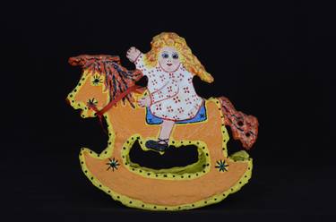 "Little Girl Riding her Rocking Horse" thumb