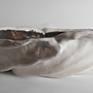 Large white and gold organic round ceramic sculpture bowl. Hand-built from buncombe white clay and glazed using a multi-glaze technique, this bowl celebrates texture.

Its dimensions are 16‘’ length, 16‘’ wide, and 4‘’ tall.

It weighs 7 lbs and 7.2 ounces.
