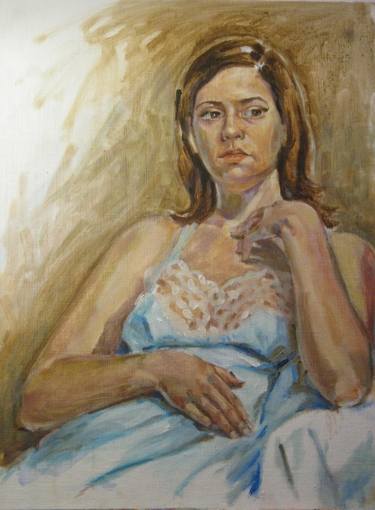 woman seated in night gown thumb