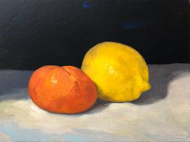 Tangerine and lemon on a cloth thumb