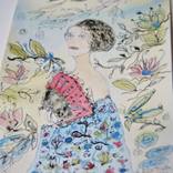 Woman in blue with flowers by Juhasz Tunde