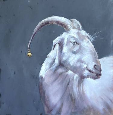 Portrait of a goat with a jingle bell. thumb