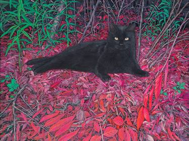 Black cat on a carpet of red leaves thumb