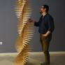 A composition of plywood pieces recreating the endless curves of the spiral.