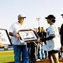 Artist David Pucciarelli Presenting Hall Of Fame New York Yankee With Art Work During An On Field Event Mickey Mantle Field