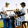 Artist David Pucciarelli Presenting Hall Of Fame New York Yankee With Art Work During An On Field Event Mickey Mantle Field