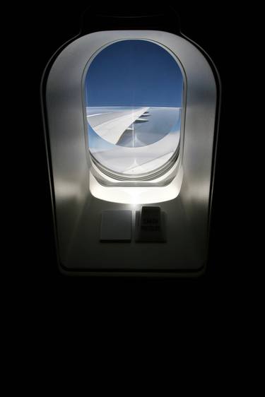 Aircraft window thumb