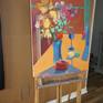 On an easel.