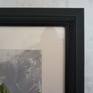 Blush colored mat and scrolled wood frame.