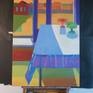 On an easel.