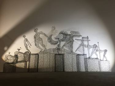 Sculptural series «Light & Shadow Geometry», art installation of five people figures with pedestals thumb
