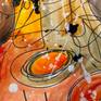 This abstract painting has been created with watercolors, acrylics, and markers on paper. It is framed and ready to hang.
