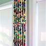 made from hundreds of hand cut shapes/transition from square to array of shapes-resin coated-passive kinetic the chamfers are hand cut fron foam board