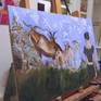 On the easel in the studio