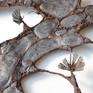 welded wall sculpture made of burnt mirror polished steel | welded with corten steel