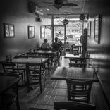 Lunch In An Empty Cafe by Erik Stouffer