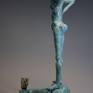 This figure is a very unique peace of art. A claycore formed by my own hands and a cold porcelain coating. Later, a silver primer was coated with an oxidizing agent to become a patina metal effect.