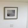 Displayed on wall.