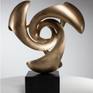 This is a cast bronze sculpture from a torus (or donut) study. it is essentially a donut with 3 cuts shown on a 7.5" x 7.5" x 4" high solid black granite base. The overall height of the sculpture and base is 21". I am fascinated by the torus shape, spirals and helices. It's inspired by the work of Max Bill. I chose a bronze casting as this would be impossible in stone. I don't have too many words about my art - that is why i sculpt. Otherwise I would be a writer! it feels to me intuitive.