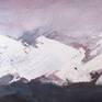 Close up of snow capped mountains.