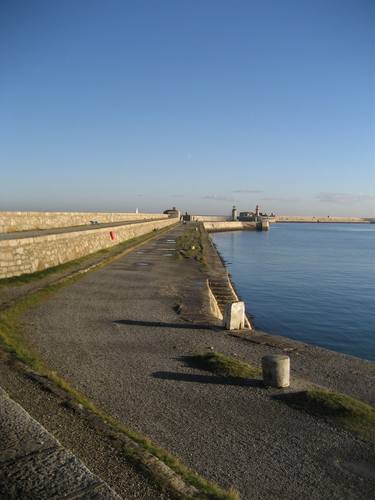 West Pier Dun Laoghaire with puddles and shadows thumb