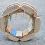 I would like to memory of classical literature.Old textile-bound books are arranged in a crib as a child's toy.Raising awareness,-how the information is changing today.