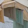 I would like to memory of classical literature.Old textile-bound books are arranged in a crib as a child's toy.Raising awareness,-how the information is changing today.