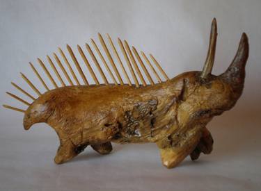 Prehistoric animal in wood thumb