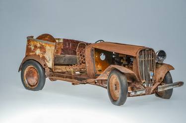 Rusty car sculpture thumb