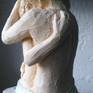 two lovers embracing each other trying to extend their passion to eternity.the sculpture is an icon of the essence of love with two bodies trying t become a unique existance.