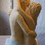 two lovers embracing each other trying to extend their passion to eternity.the sculpture is an icon of the essence of love with two bodies trying t become a unique existance.