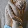 two lovers embracing each other trying to extend their passion to eternity.the sculpture is an icon of the essence of love with two bodies trying t become a unique existance.
