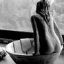 A woman bathing executed in fired clay ,in a modern style ,where i tried to have an atmosphere similar to Degas and Bonnard.If it is asked the same piece would be equally good in a different material such as bronze.Using only one material the studying of form is more evident in its results .