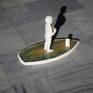 i tried to create a narrative using symbols and archetypes that refer to all humans.a child,a boat,a home ,a fish ,sea landscape in thh shape of a boat....the atmosphere of a child seaking truth and comfort in a lonely vessel is there and the story is for everyone to imagine...